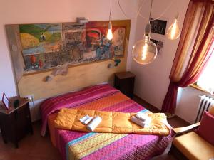 Postel nebo postele na pokoji v ubytování Hotel La Pace + 16 fotografií
