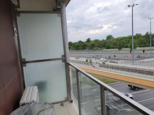 a window in a building with a view of a highway at Apartament na Lazurowej in Warsaw