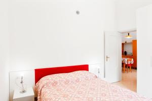 Postel nebo postele na pokoji v ubytování Borghetto Pedale