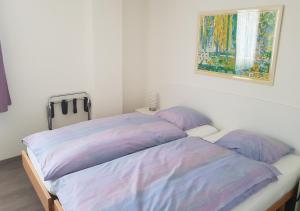 Postel nebo postele na pokoji v ubytování Hotel Le Rivage