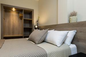 Posteľ alebo postele v izbe v ubytovaní Hotel Montmar