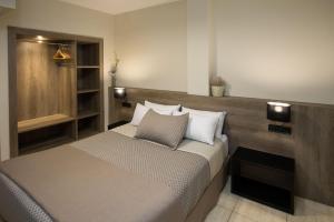 Posteľ alebo postele v izbe v ubytovaní Hotel Montmar