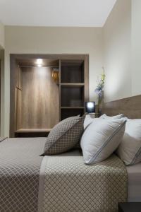 Posteľ alebo postele v izbe v ubytovaní Hotel Montmar