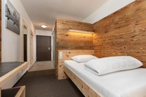 Łóżko lub łóżka w pokoju w obiekcie Hotel Nassereinerhof