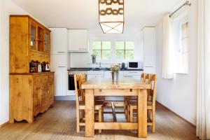 Kuchyň nebo kuchyňský kout v ubytování Chandolin Boutique Hotel