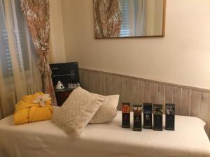 Postel nebo postele na pokoji v ubytování Hotel La Pace