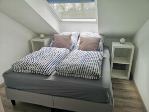 Кровать или кровати в номере Landhaus Kaisershof - Ferienwohnungen auf dem Land