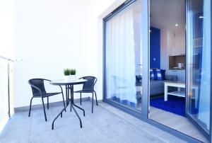 a dining room with a table and chairs at Sunset Resort, Nadmorska 106 in Grzybowo +287 photos