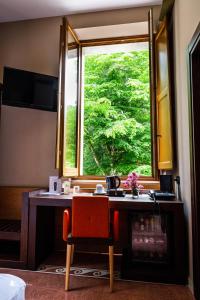 Sjónvarps- og/eða afþreyingartæki á Elda Hotel