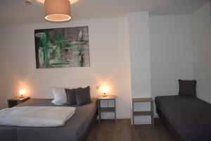 Postel nebo postele na pokoji v ubytování Hotel Hegemann garni