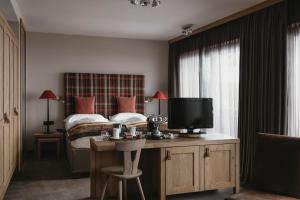 Sjónvarps- og/eða afþreyingartæki á Eco & Wellness Boutique Hotel Sonne
