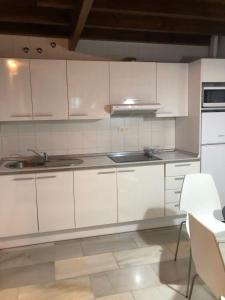 A kitchen or kitchenette at Embrujo