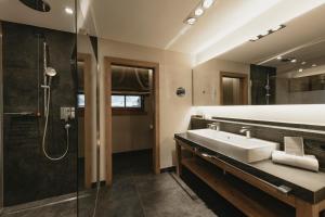 Baðherbergi á Eco & Wellness Boutique Hotel Sonne