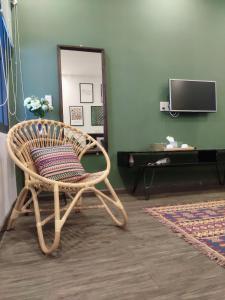 TV in/ali zabaviščno središče v nastanitvi Kon-Tiki DaNang Hostel