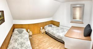 Voodi või voodid majutusasutuse Chaty Ivana 18 a 19 u Hustopecskych jezer toas +29 fotot