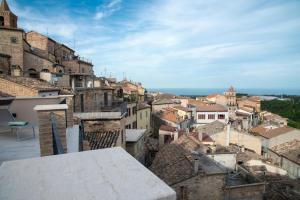 a view of a city from the roof of a building at PALAZZO ILLUMINATI in Ripatransone