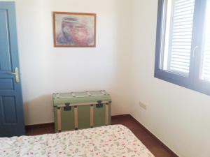 Łóżko lub łóżka w pokoju w obiekcie Casa Rural La Aulaga