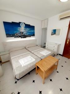 Posteľ alebo postele v izbe v ubytovaní Hostal Kokkola