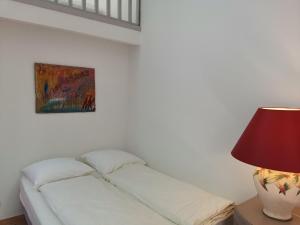 Ein Bett oder Betten in einem Zimmer der Unterkunft Cassis Hostel