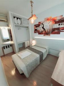 Posteľ alebo postele v izbe v ubytovaní Hostal Kokkola