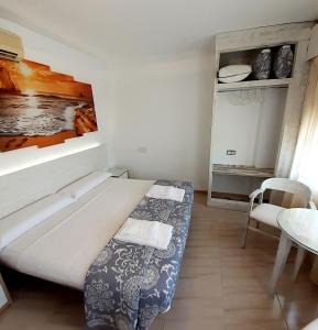 Posteľ alebo postele v izbe v ubytovaní Hostal Kokkola
