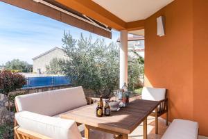 Posedenie v ubytovaní Villa Veronica with great sea view & private pool - calm & relax holidays in Istria