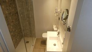 Koupelna v ubytování Hotel Zeus