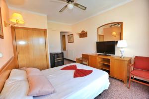 Telewizja i/lub zestaw kina domowego w obiekcie Hotel Manaus