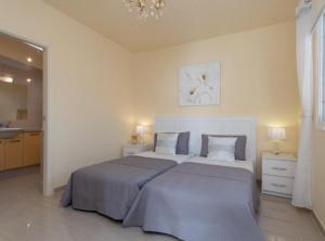 Postel nebo postele na pokoji v ubytování Villa Sue + 29 fotografií