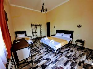 Letto o letti in una camera di Green Flower Hotel