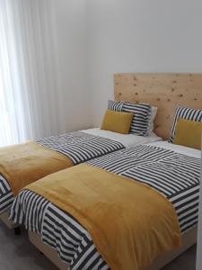 Een bed of bedden in een kamer bij Casa da Vila