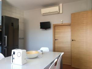 TV a/nebo společenská místnost v ubytování CASA Campelo - Playas de Pinténs - HIO - Ría de Aldán - CANGAS