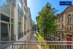 a view of an alley between two buildings at Jogailos Residence peaceful Old Town luxury 3 bdr, 2 bthr, FREE GARAGE, top-speed WIFI in Vilnius +57 photos
