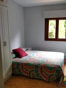 Ένα ή περισσότερα κρεβάτια σε δωμάτιο στο Casa las Niñas