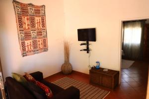 TV a/nebo společenská místnost v ubytování Butterfly Apartments