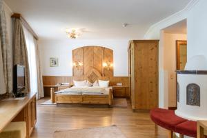 Posteľ alebo postele v izbe v ubytovaní Hotel Garni Castel B&B