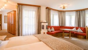 Posteľ alebo postele v izbe v ubytovaní Hotel Garni Castel B&B