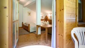Posteľ alebo postele v izbe v ubytovaní Hotel Garni Castel B&B