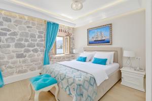 Postel nebo postele na pokoji v ubytování Hotel Libertas