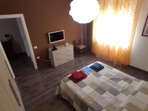 Posteľ alebo postele v izbe v ubytovaní SPAZIO-CONFORT-FITNESS