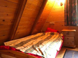 Krevet ili kreveti u jedinici u okviru objekta Domek w Lesie