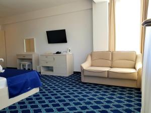 Μια τηλεόραση ή/και κέντρο ψυχαγωγίας στο Eros Beach Resort