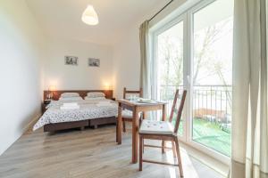 Postel nebo postele na pokoji v ubytování Na zoloju