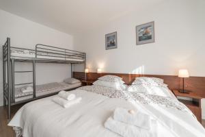 Postel nebo postele na pokoji v ubytování Na zoloju