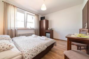Postel nebo postele na pokoji v ubytování Na zoloju
