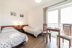 Postel nebo postele na pokoji v ubytování Na zoloju