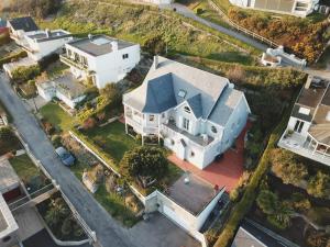 an aerial view of a large white house at Aux Premières Loges in Fécamp