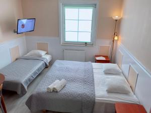 Gallery image of Apartamenty i Pokoje Magnolia in Dźwirzyno +21 photos