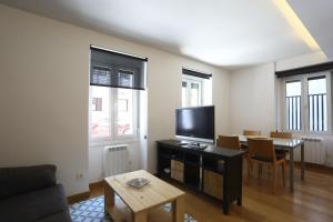 Telewizja i/lub zestaw kina domowego w obiekcie Bakea by Smiling Rentals