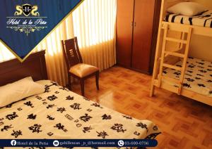 Postel nebo postele na pokoji v ubytování Hotel de la Peña